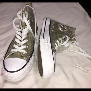Gold glitter high top converse